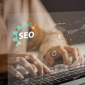 Person typing on a laptop with an overlay that shows SEO metrics.