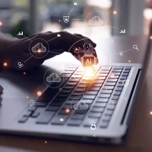 Laptop keyboard with a person typing. Overlay of AI, search, and metric icons to indicate AI-driven marketing.